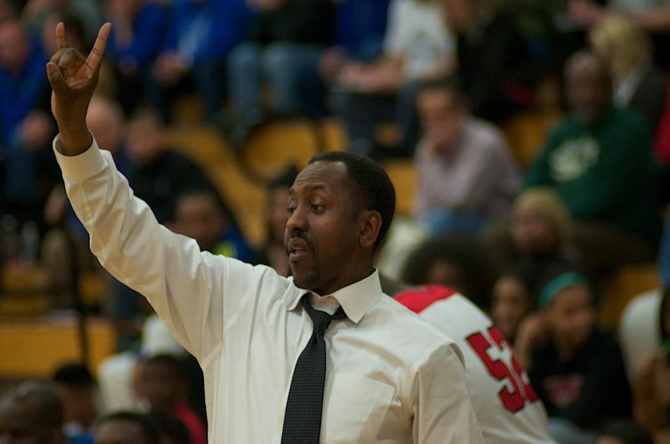 Middle School Principal Danny Young coaches the high school mens basketball team. Young will replace Randall Yates as Woodbury principal next year.