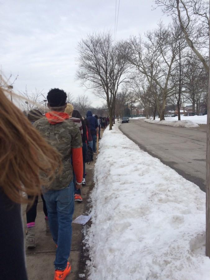 Students walk outside during a fire drill Feb. 11.
