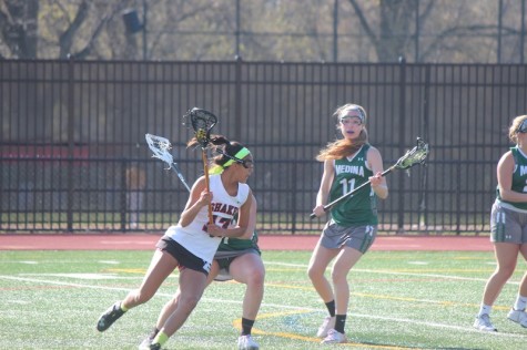 Sophomore Haley Brady goes in for a shot April 28, 2015.