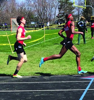 Senior Brian Lief and junior Justyn Moore compete in a meet.