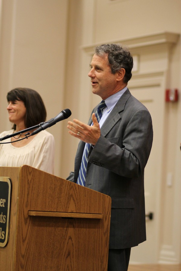 Sen. Sherrod Brown speaks at the press conference event with English teacher Jody Podl and concerned parent Jennie Kaffen.
