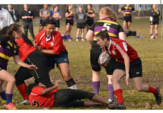 Rachel Elson (15), sophomore Samira Colbert and sophomore Jaliyah Whitmore play in a game against St. Joesphs Academy. 