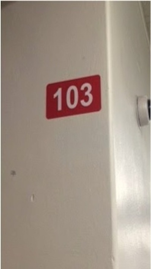 The new red and white room numbers that were installed Sept. 8, 2015.
