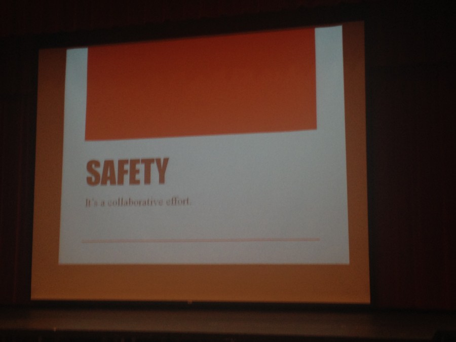 This safety PowerPoint played behind Principal James Reed during the assembly.