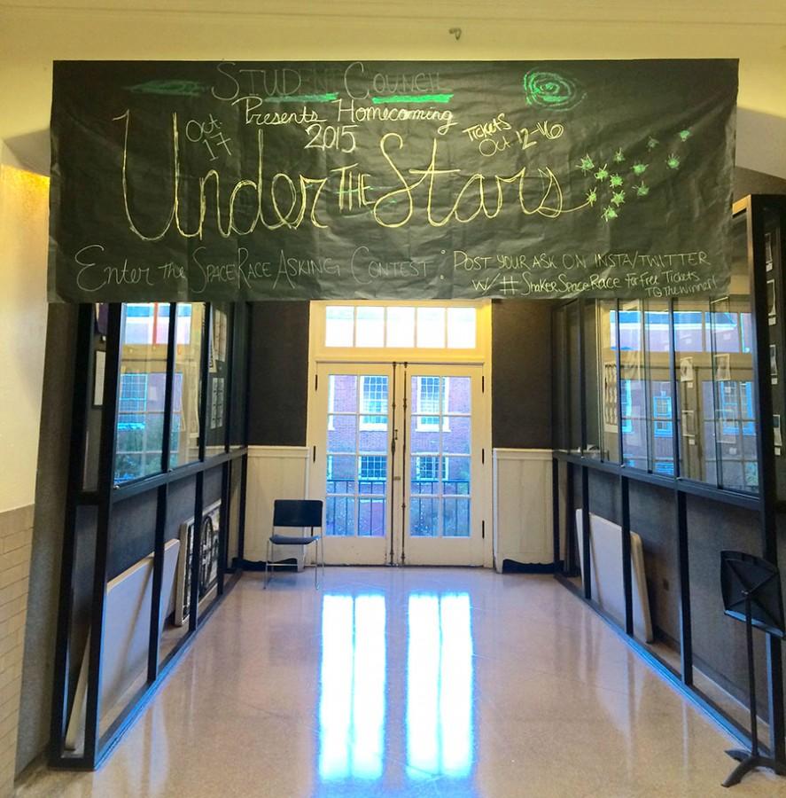 A banner displaying the 2015 homecoming theme hanging in the Ely gallery near the main office Oct. 6.
