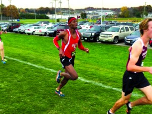 Senior Justyn Moore runs at the Youngstown REgional Meet. 