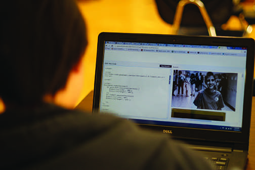 Sophomore Jocelyn Ting works on coding her National History Day website. Ting has been independently learning computer science for three years.