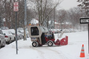 District personnel cleared sidewalks before school this morning. 