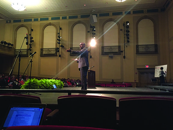 Superintendent Dr. Gregory C. Hutchings addresses an audience of students, teachers, parents and community members at the annual State of The Schools Meeting.