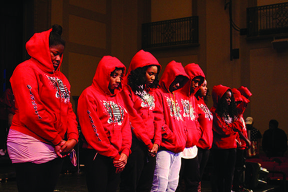Sankofa members put their hoods up for a 10-second moment of silence to honor Trayvon Martin during the Feb. 26 Sankofa performance.