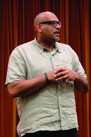 John Amaechi speaks to Shaker students in the small auditorium Oct. 22, 2014. In 2007, Amaechi, became the first NBA player to come out. He encourages athletes to be themselves, but, he said, “You can’t tell an athlete to come out.”