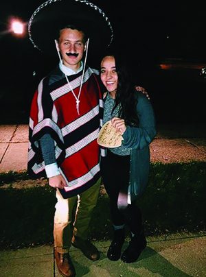 Junior Andrew Roth asked Kristi Seman to homecoming by wearing a sombrero and writing his invitation on a tortilla. 
