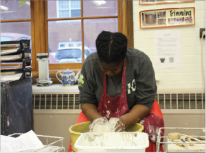 Sophomore Dawn Falokun shapes a clay piece on a pottery wheel. Art students at Shaker enjoy the break from daily stressors that art gives them. “For me it’s like a way to step back from the school and academic part and just focus on my other hobbies,” said senior Lily Schulte-Lawrence.