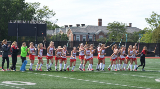 The Shaker Field Hockey team runs on the field following an 8-0 victory against the Kent Roosevelt Rough Riders.