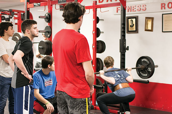 Senior Daniel Crouse back squats during zero period Weight Training Jan. 25. 
Thirty people are currently enrolled in the class.