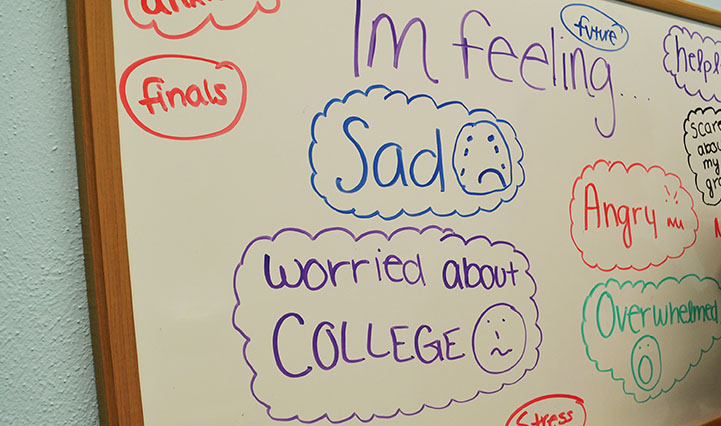 A white board in the zen room displays feelings students have written.  “Teachers know that if they find something in writing, or if they hear something, they need to let someone know right away. And they do — and they’ve saved lives,” school nurse Paula Damm said.