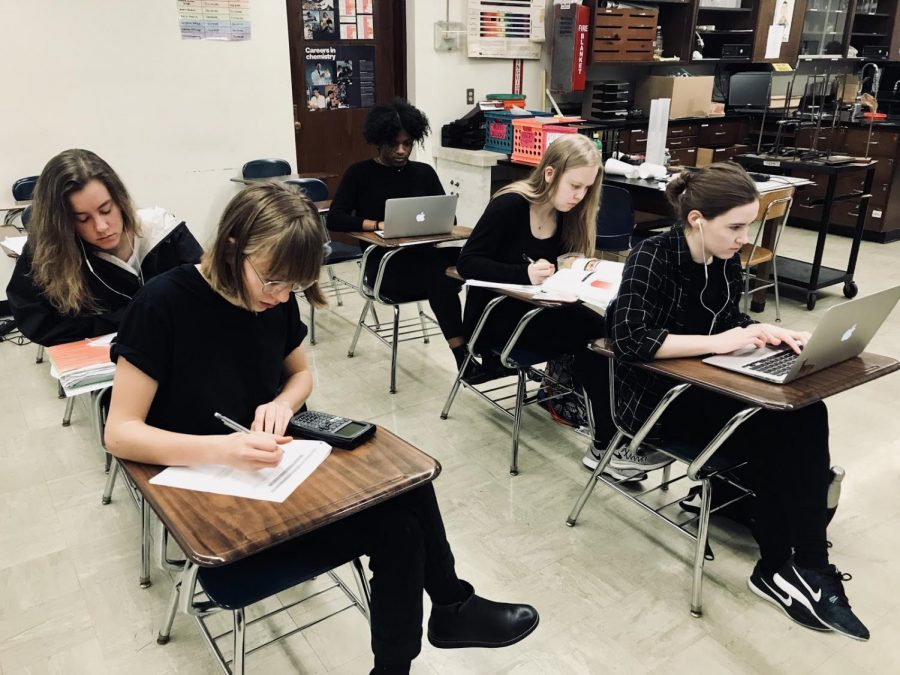 A senior chemistry class works on an assignment during the blackout day. “It could potentially really influence our congressman and our senators and show them that just because we can’t vote, and a lot of us aren’t 18, we can still have a voice in society, senior Sophie Browner said.