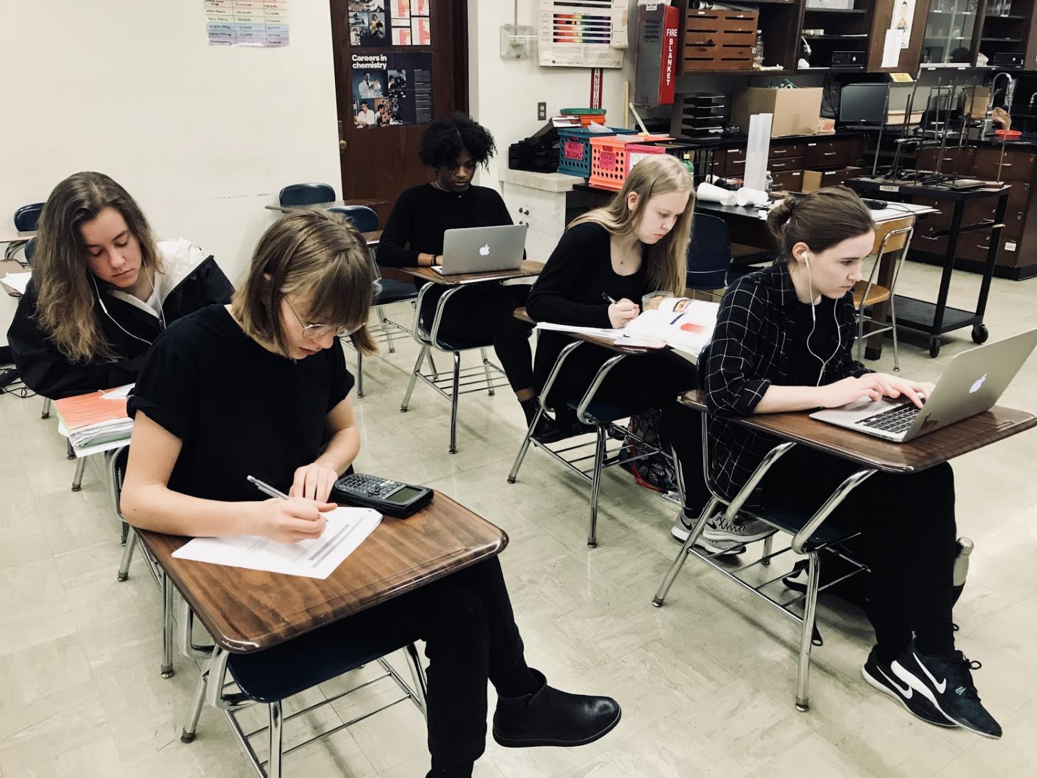 A senior chemistry class works on an assignment during the blackout day. “It could potentially really influence our congressman and our senators and show them that just because we can’t vote, and a lot of us aren’t 18, we can still have a voice in society,