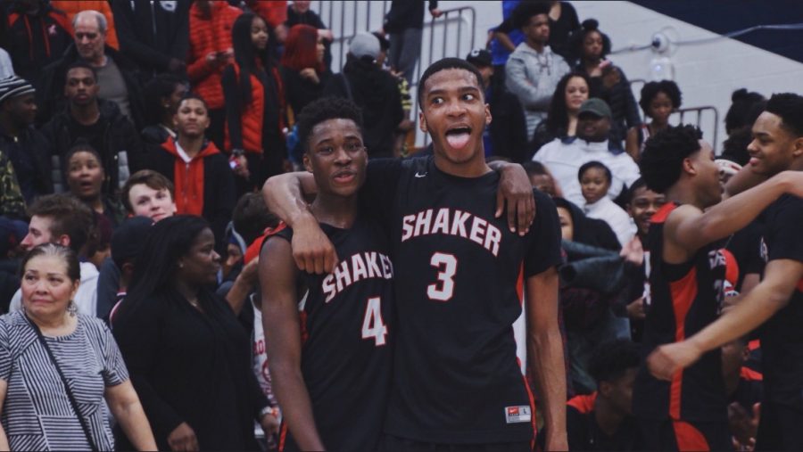 Senior stars Dale Bonner (left) and Christian Guess (right) celebrate their 63-60 victory over Garfield Heights, the third ranked team in Northeast Ohio. 