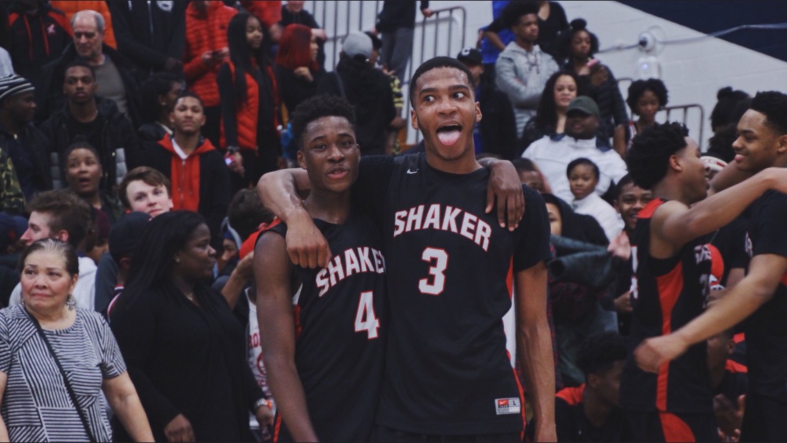 Senior stars Dale Bonner (left) and Christian Guess (right) celebrate their 63-60 victory over Garfield Heights, the third ranked team in Northeast Ohio.