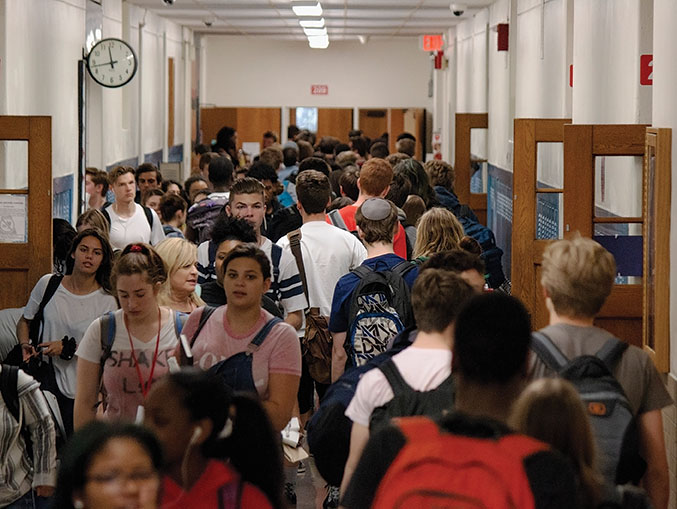 crowded high school hallway with kids