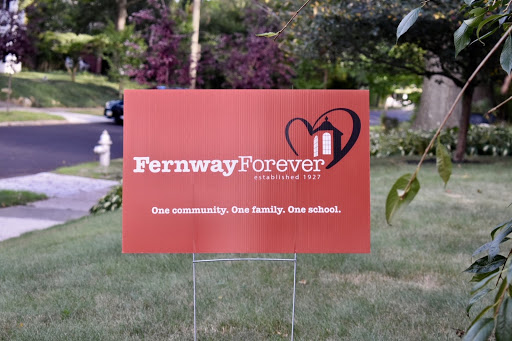 Neighbors who support of reopening Fernway Elementary School boast their ‘Fernway Forever’ signs, which line the streets of the neighborhood.