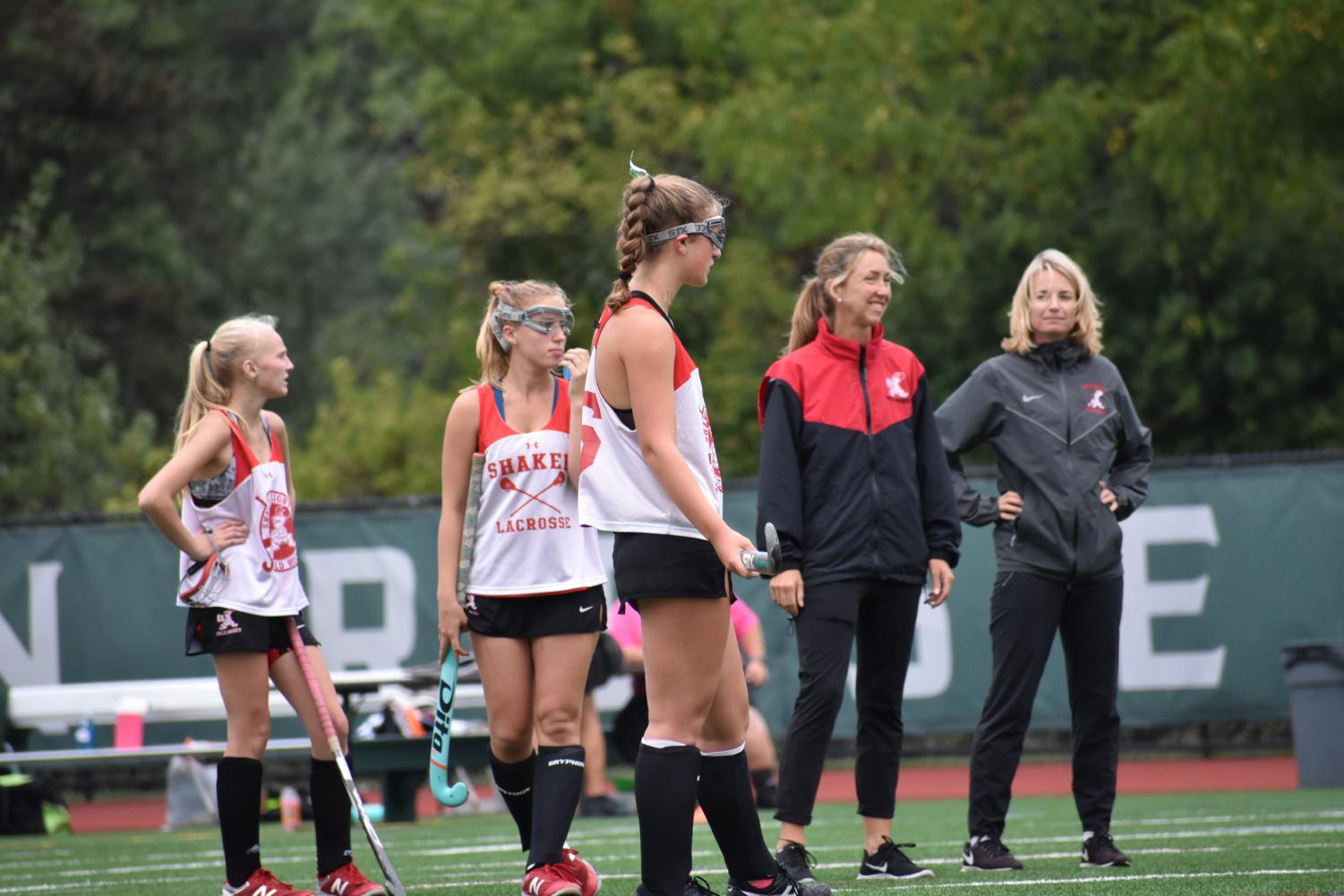 Field hockey players warm up before a game at Russell H Rupp Stadium. On Mondays, their practices start at 2:30 p.m.