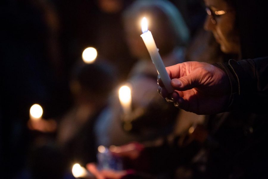 Mourners light candles at a vigil for the victims of the Pittsburgh synagogue shooting. The victims were the latest victims of the mass shooting cycle. The mass shooting cycle needs to end, but the only way to end it is by voting.