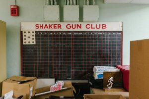 Beneath the boxes and discarded trophies stashed away in the basement of the high school lie the remnants of another time.