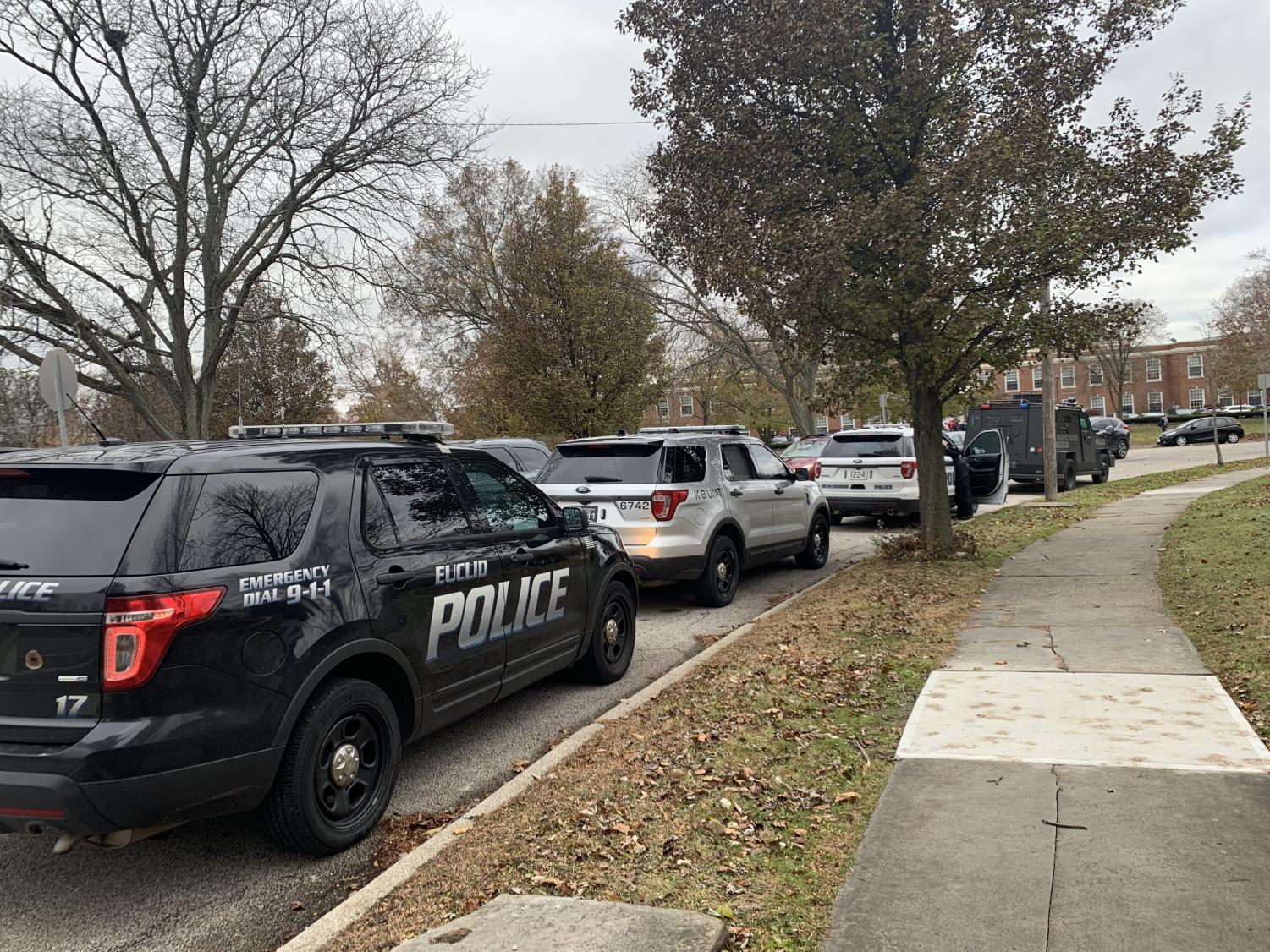 police car and a shaker bearcat vehicle were stationed near the