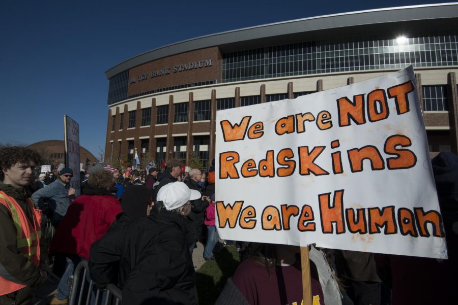 Protesters marched through Minneapolis to TCF Stadium, where the Minnesota Vikings were playing the Washington Redskins Nov. 2, 2014. The protesters called for the Washington team to abandon the name "redskins" and the image of a Native American as their mascot.