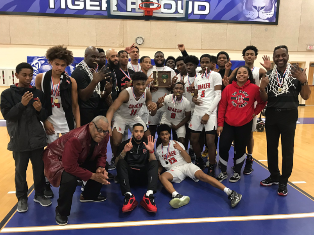 The mens basketball team after winning their district on Saturday.