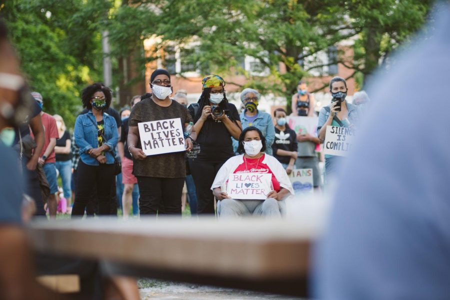 The life of George Floyd is honored at a candlelight vigil.