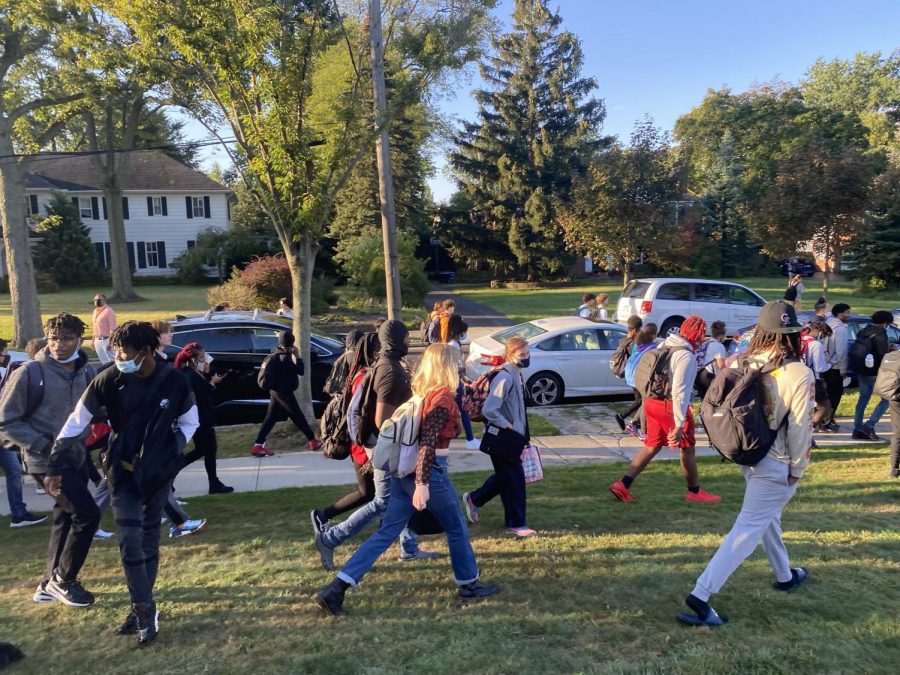 Students were instructed to move from the front oval to the stadium field following an evacuation due to an unknown threat.