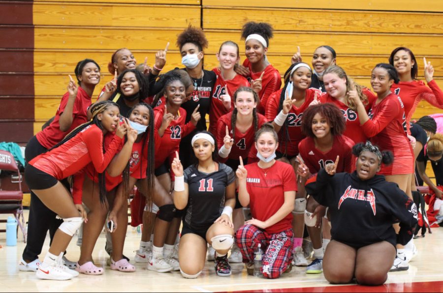 The volleyball team celebrates an undefeated season and second consecutive Lake Erie League Championship