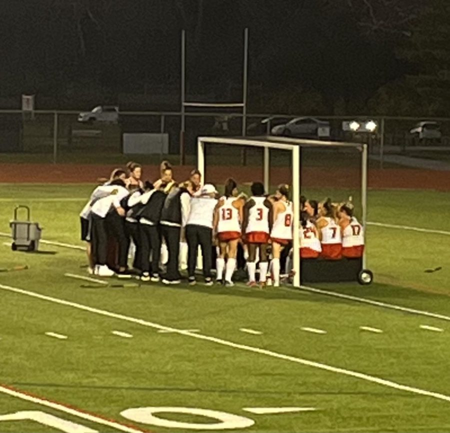 The field hockey team gathers at Thomas Worthington High Schools field before the state semifinal contest Thursday. It was the Raiders second consecutive trip to the final four. 