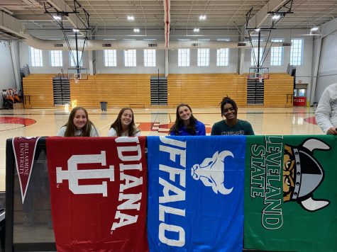 Seniors Skylar Sokal, Jaierva Baeza, Chloe Brown and Allana Appleby, who signed letters of intent Nov. 9 in the north gym, will continue their field hockey and volleyball careers next year.