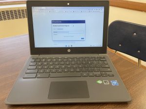 Picture of an open chromebook with PowerSchool login