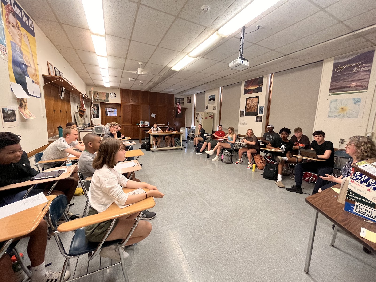 AP U.S. History teacher Sarah Davis and her third-period class discuss the film “Dr.Strangelove” in Room 302 June 2. Students took the APUSH exam May 5. According to Davis, students who navigate the course gain skills that can help them succeed in college and beyond. Students can get help in study circles and during conference periods, which occur Wednesdays and Fridays from 3-4 p.m.