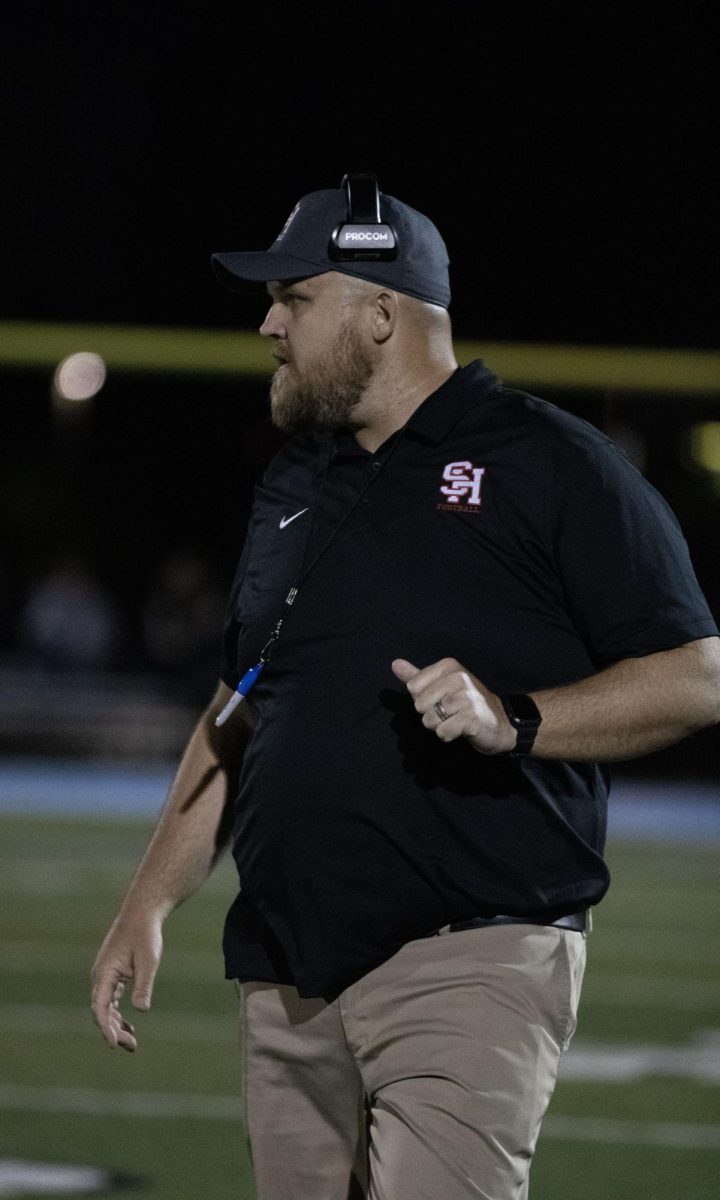 Head Coach Alex Nicholson, pictured Aug. 18 during the Raiders defeat of Willoughby South High School, said he has never heard the word Nazi used to indicate plays. Shaker football players choose the terms they will use, and coaches approve them, he said. 