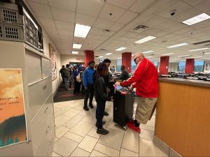 Dean of Students Greg Zanelli Scans IDs and issues tardy passes to students late to first period Oct 9.