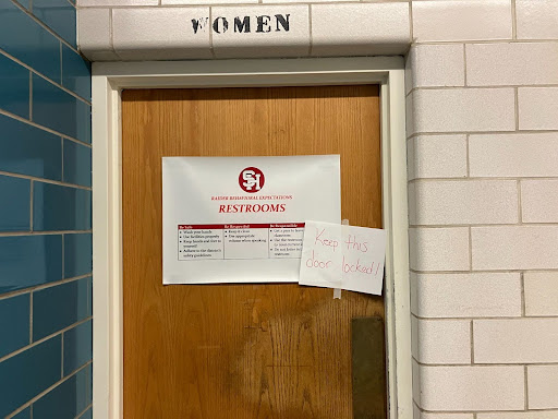 A sign instructs staff to keep the women’s restroom next to Room 260 locked May 24, when a blocked sewage pipe forced restroom closures throughout the building.