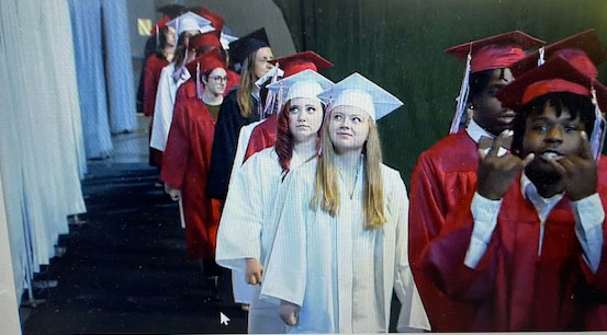 Members of the class of 2023 enter the CSU Wolstein Center during their June 6 commencement ceremony. Screen capture of Shaker Heights City Schools broadcast. 