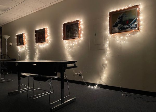 Lights frame artwork in Room 216, helping to create a peaceful mood in the zen, or mindfulness room created by guidance counselor Catherine Szendrey.  
