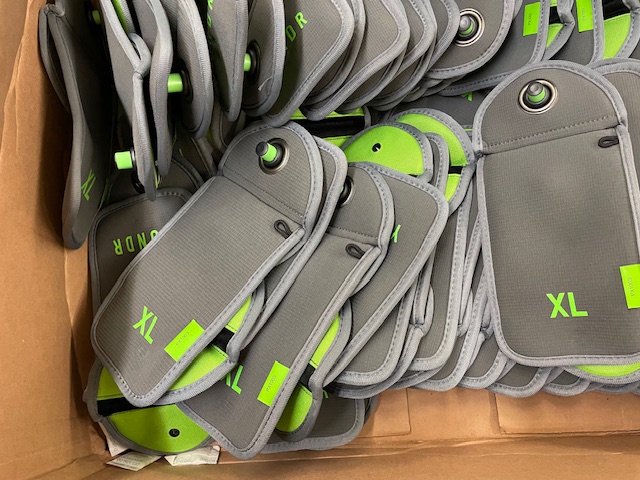 Yondr pouches awaiting distribution before the beginning of school in 2024. The personal electronic device policy is a state mandate, but the decision to use lockable phone storage was the district's, chosen in part to limit phone use to document and encourage fighting.  