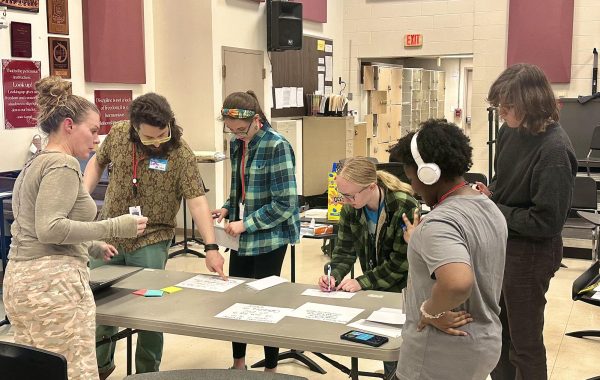 GSA members write letters to Ohio representatives during their May 28 meeting. GSA meetings typically consist of fun activities, such as playing games, as well as educational activities, such as reading LGBTQ+ literature or learning about LGBTQ+ history, according to co-adviser Nick LaPete.