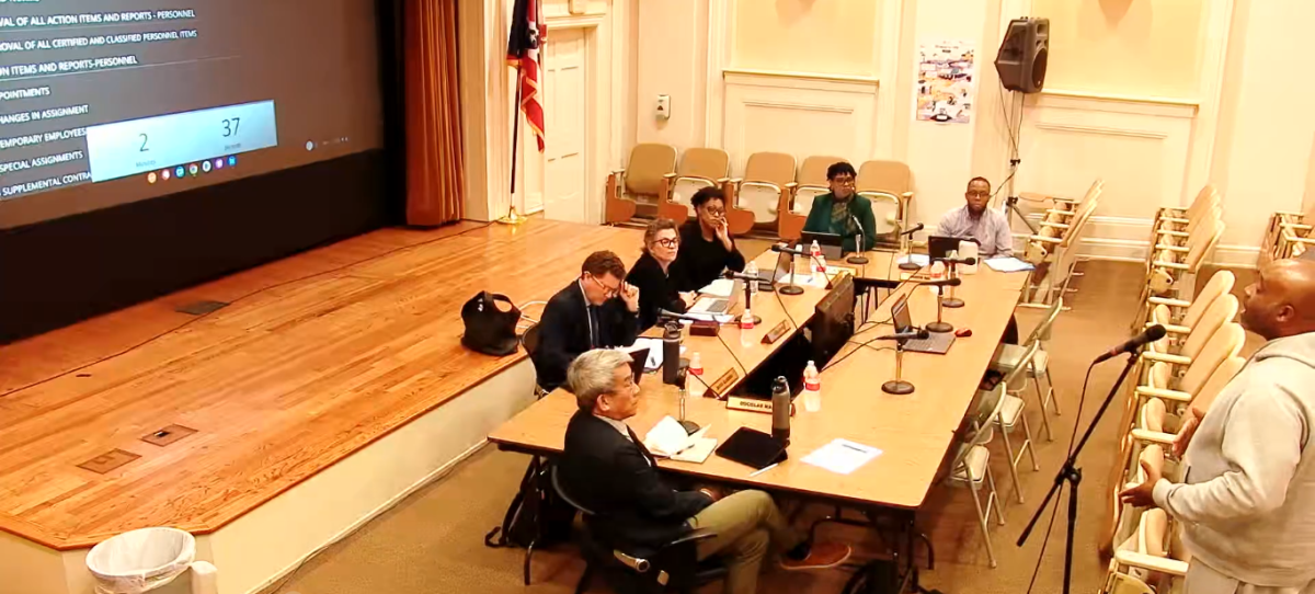 Shaker parent Troy Jordan speaks during the public comment period at the Sept. 9 Board of Education meeting in the high school’s small auditorium. Jordan said that he wanted an opportunity for open dialogue with the board about a change in the district’s policy on unexcused absences, which no longer allows parents discretion on their students’ absences.
