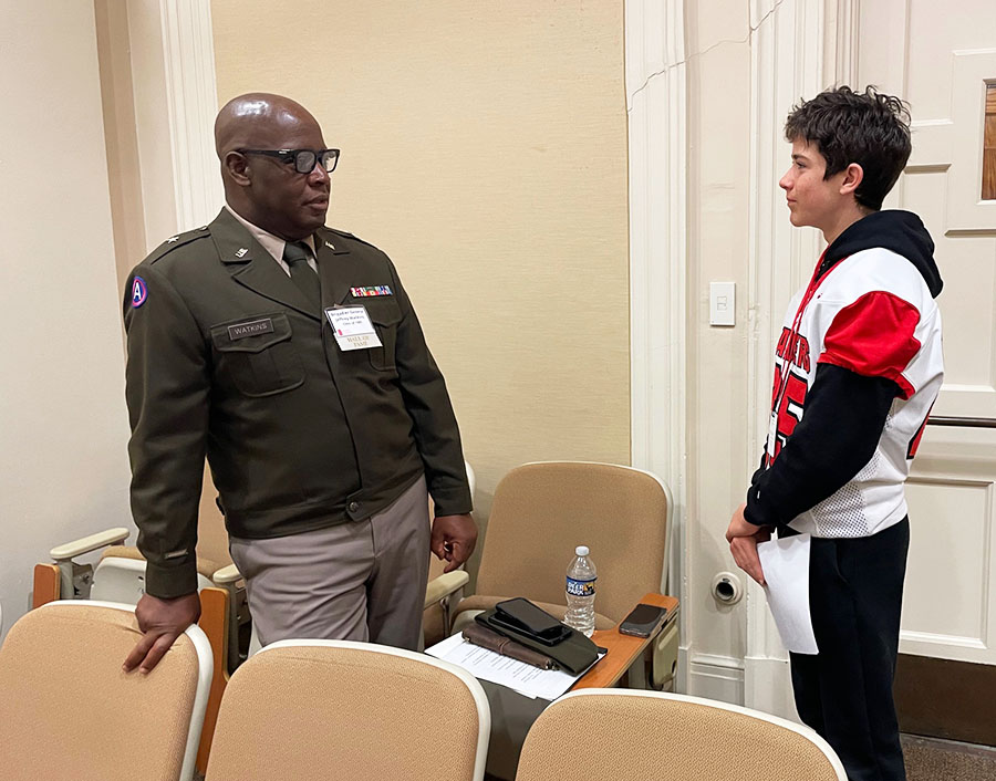Brigadier General Jeffrey Watkins speaks with Spotlight Reporter Charlie Howell during first period Oct. 10 in the small auditorium. Watkins was among the nine 2025 inductees to the Shaker Schools Foundation's Alumni Hall of Fame. He told Howell that that he wore the same jersey number, 85, while playing football for the Raiders. The inductees addressed an assebmly audience in the large auditorium during second period. 