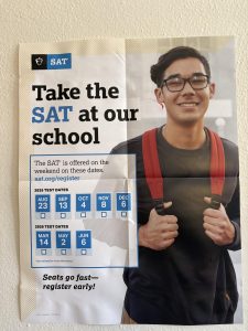 A flyer promoting the SAT sits on display in the guidance department Oct. 16. Students took the PSAT and SAT in-school Oct. 15.