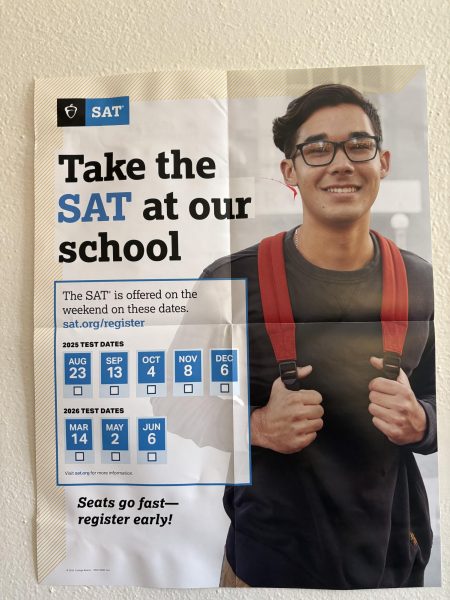 A flyer promoting the SAT sits on display in the guidance department Oct. 16. Students took the PSAT and SAT in-school Oct. 15.